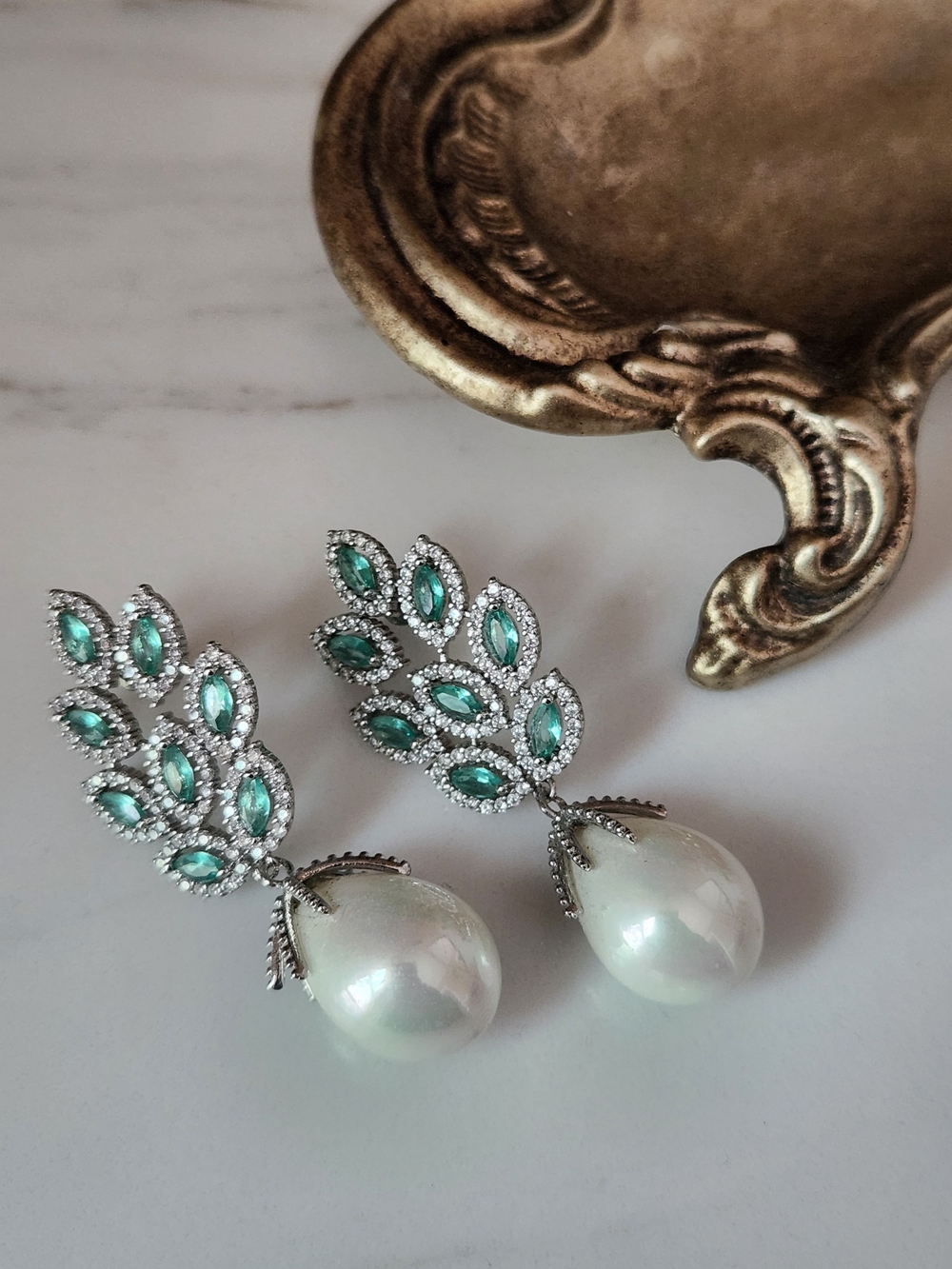 Elegant Silver Faux Pearl Drop Earrings with Green Crystal Leaves